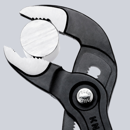 Клещи переставные COBRA сантехнические с фиксатором 27 мм (1) под ключ 27 мм L-125 мм Cr-V серые обливные рукоятки