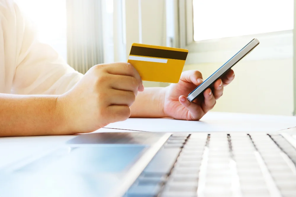 woman-using-mobile-phone-shopping-online-pay-by-credit-ca.jpg